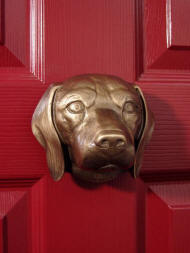 Beagle door knocker on red door