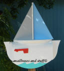Sail boat mailbox with light blue and gray sails