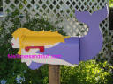 blonde mermaid mailbox in purple suit ©